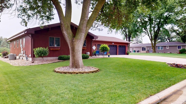2017 Highland Ave, Albert Lea, MN 56007 - view of front of home with a garage, a front yard, and concrete driveway