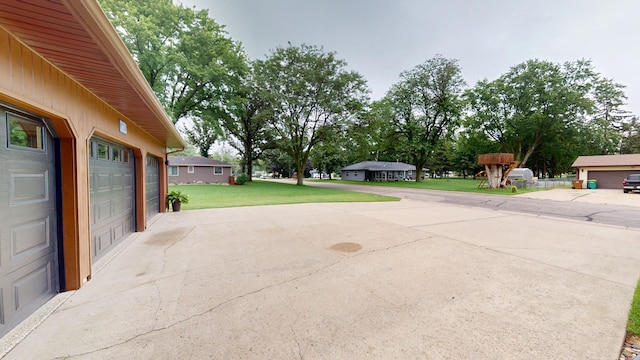2017 Highland Ave, Albert Lea, MN 56007 - view of patio / terrace featuring a garage