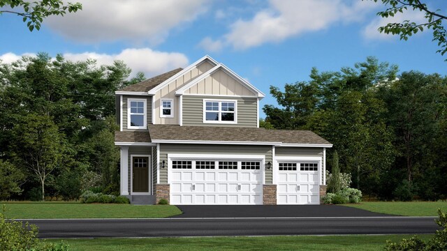 1561 143rd St E, Rosemount, MN 55068 - view of front of home with board and batten siding, an attached garage, a front lawn, and driveway