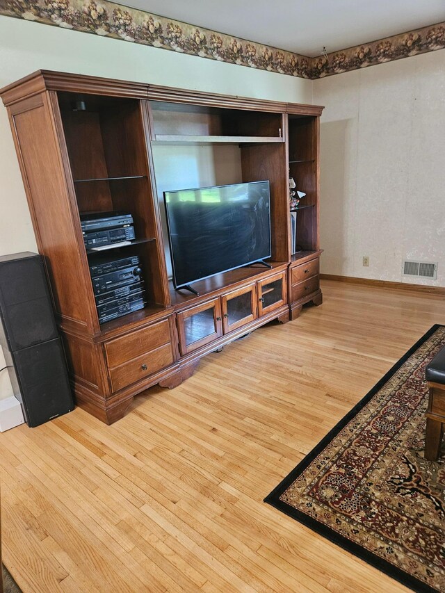 5306 Boulder Ln, Brooklyn Center, MN 55429 - living area with wood finished floors and baseboards