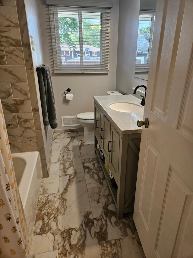 5306 Boulder Ln, Brooklyn Center, MN 55429 - bathroom featuring marble finish floors and vanity