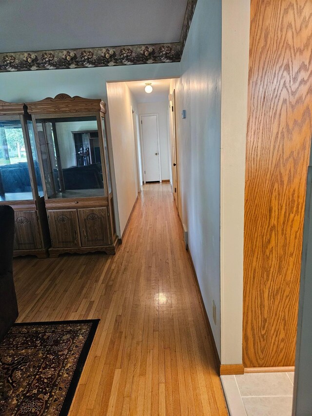 5306 Boulder Ln, Brooklyn Center, MN 55429 - corridor featuring light wood-type flooring