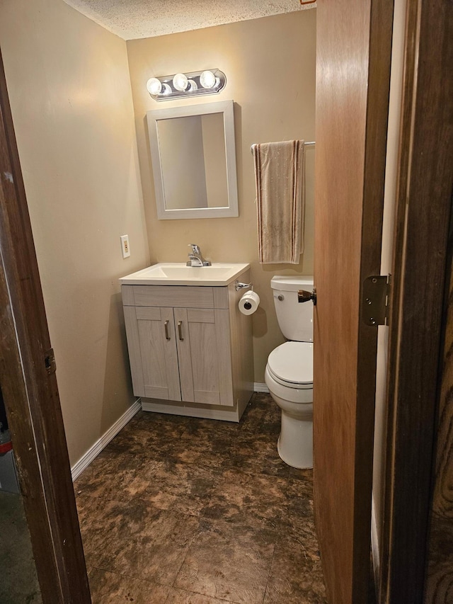 5306 Boulder Ln, Brooklyn Center, MN 55429 - half bathroom with vanity and a textured ceiling