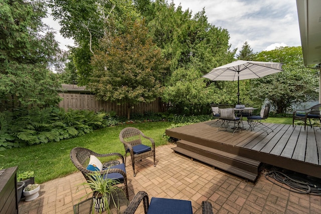 625 Folwell Ln SW, Rochester, MN 55902 - wooden terrace featuring a fenced backyard, a patio area, and outdoor dining space