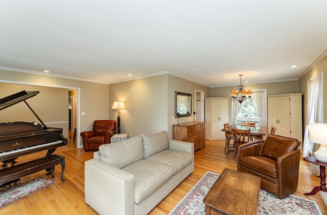625 Folwell Ln SW, Rochester, MN 55902 - living area featuring a chandelier, light wood-type flooring, ornamental molding, and recessed lighting