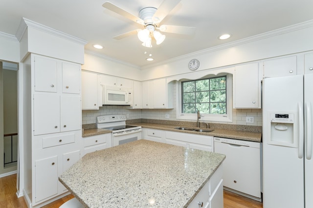 625 Folwell Ln SW, Rochester, MN 55902 - kitchen with white appliances, white cabinets, ornamental molding, decorative backsplash, and recessed lighting