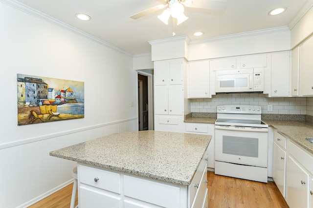 625 Folwell Ln SW, Rochester, MN 55902 - kitchen with white appliances, light wood finished floors, crown molding, a center island, and ceiling fan