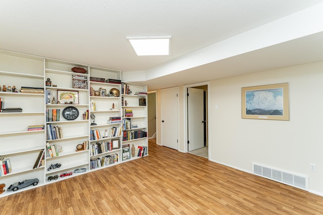 625 Folwell Ln SW, Rochester, MN 55902 - miscellaneous room featuring light wood-style flooring