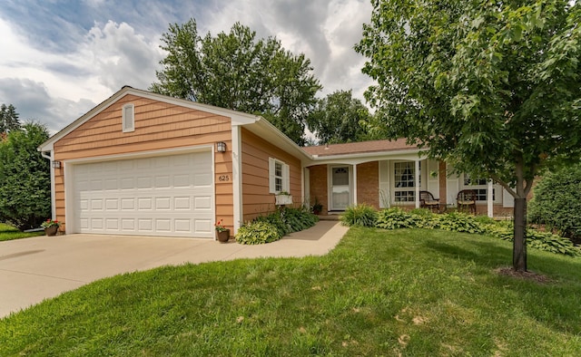 625 Folwell Ln SW, Rochester, MN 55902 - ranch-style house featuring a front lawn, concrete driveway, covered porch, and a garage