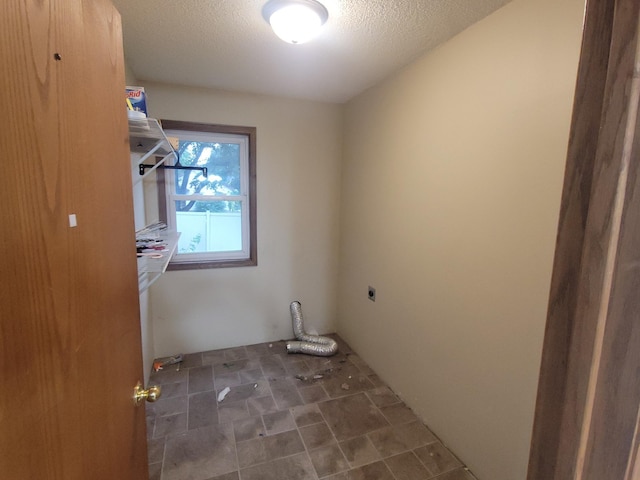 302 3rd St W, Hastings, MN 55033 - laundry room with hookup for an electric dryer and a textured ceiling