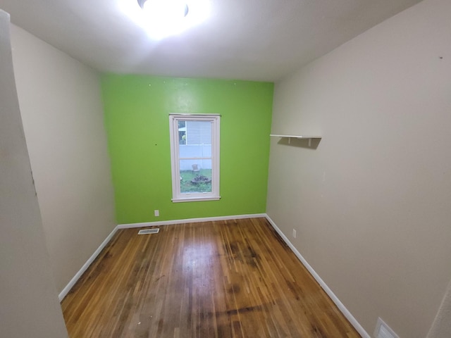 302 3rd St W, Hastings, MN 55033 - unfurnished room featuring hardwood / wood-style flooring and baseboards