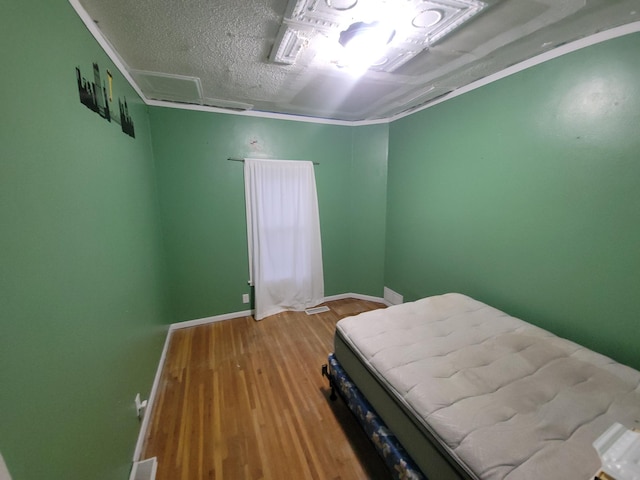302 3rd St W, Hastings, MN 55033 - bedroom with wood finished floors and baseboards