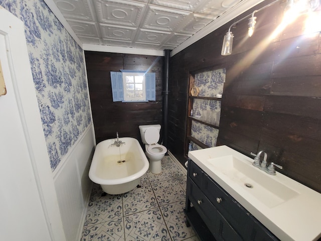 302 3rd St W, Hastings, MN 55033 - full bathroom featuring a freestanding tub, wallpapered walls, vanity, an ornate ceiling, and tile patterned flooring