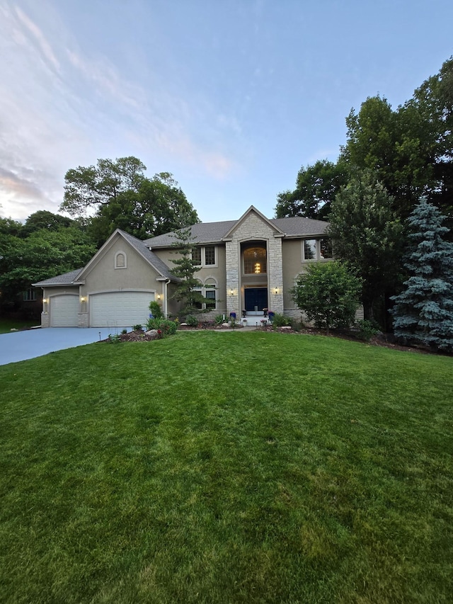 6354 Oxbow Bnd, Chanhassen, MN 55317 - traditional home with concrete driveway, a front lawn, and a garage
