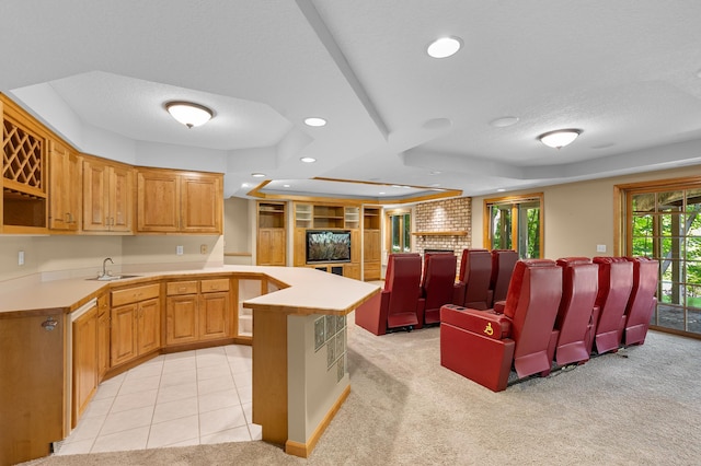 6354 Oxbow Bnd, Chanhassen, MN 55317 - kitchen featuring a peninsula, recessed lighting, light countertops, open floor plan, and light colored carpet