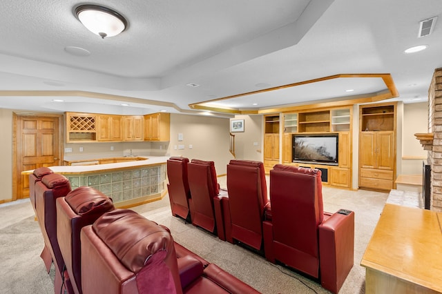 6354 Oxbow Bnd, Chanhassen, MN 55317 - home theater room with a raised ceiling, light colored carpet, wet bar, recessed lighting, and a textured ceiling