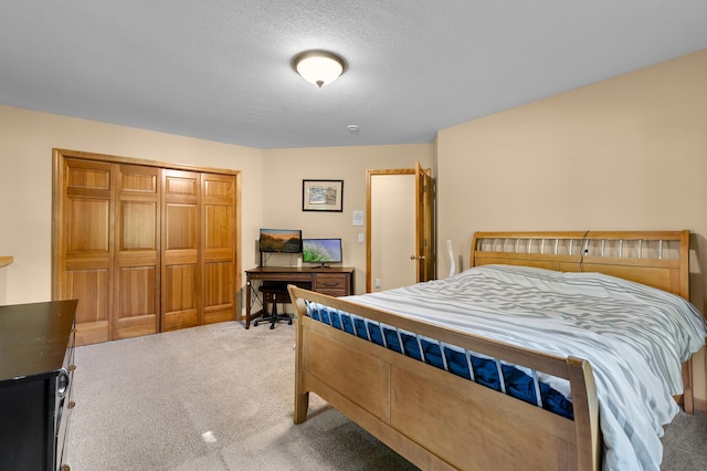 6354 Oxbow Bnd, Chanhassen, MN 55317 - bedroom with light colored carpet, an office area, a closet, and a textured ceiling