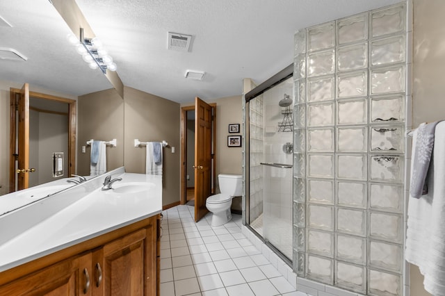 6354 Oxbow Bnd, Chanhassen, MN 55317 - full bathroom with vanity, a stall shower, tile patterned flooring, and a textured ceiling