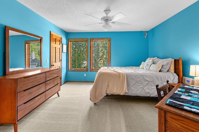 6354 Oxbow Bnd, Chanhassen, MN 55317 - bedroom with a textured ceiling, light colored carpet, and a ceiling fan