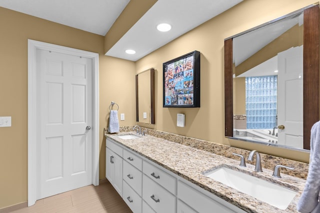 6354 Oxbow Bnd, Chanhassen, MN 55317 - bathroom with double vanity and recessed lighting