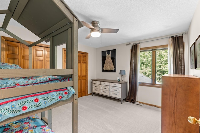6354 Oxbow Bnd, Chanhassen, MN 55317 - bedroom featuring light carpet, a textured ceiling, and a ceiling fan