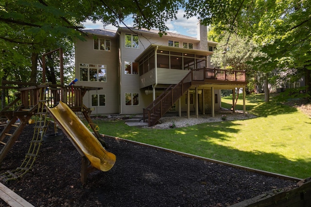6354 Oxbow Bnd, Chanhassen, MN 55317 - rear view of property with a sunroom, a playground, a chimney, and a yard