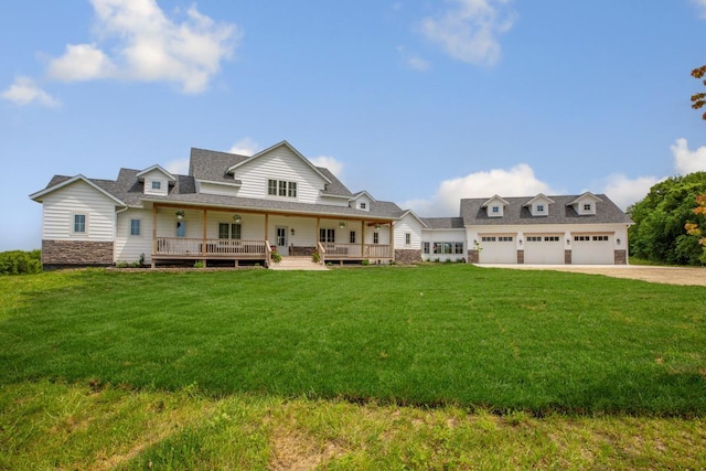 13827 Halstad Ave, Lonsdale, MN 55046 - view of front facade featuring driveway, a porch, a front yard, and a garage