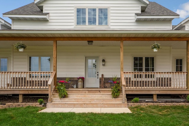 13827 Halstad Ave, Lonsdale, MN 55046 - property entrance with covered porch and a shingled roof