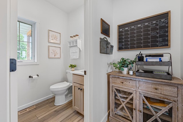 13827 Halstad Ave, Lonsdale, MN 55046 - bathroom featuring wood finished floors and vanity