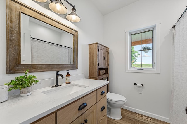 13827 Halstad Ave, Lonsdale, MN 55046 - bathroom with vanity and wood finished floors