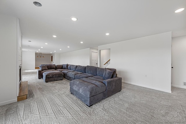 13827 Halstad Ave, Lonsdale, MN 55046 - carpeted living room with recessed lighting and stairway