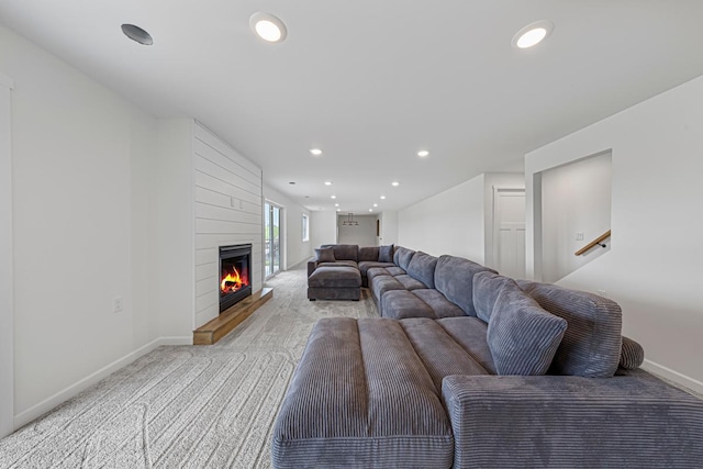 13827 Halstad Ave, Lonsdale, MN 55046 - living area with light carpet, recessed lighting, and a fireplace