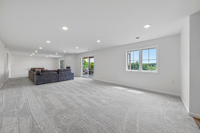 13827 Halstad Ave, Lonsdale, MN 55046 - unfurnished living room featuring carpet floors and recessed lighting