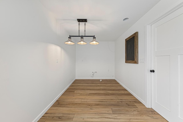 13827 Halstad Ave, Lonsdale, MN 55046 - unfurnished room with light wood-style floors and baseboards