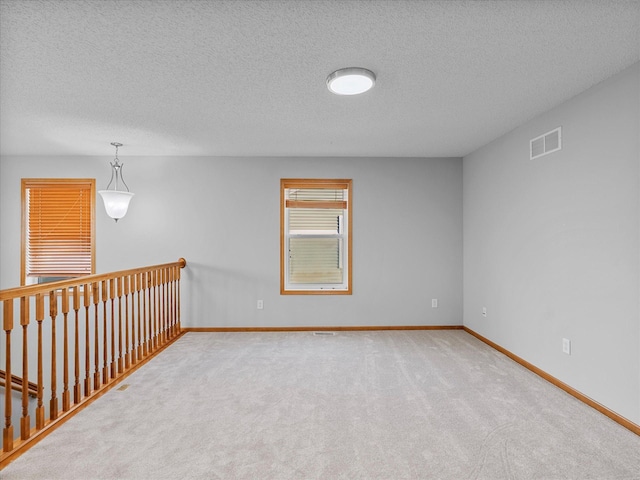 1788 Fescue Ct, Shakopee, MN 55379 - unfurnished room with a textured ceiling and carpet
