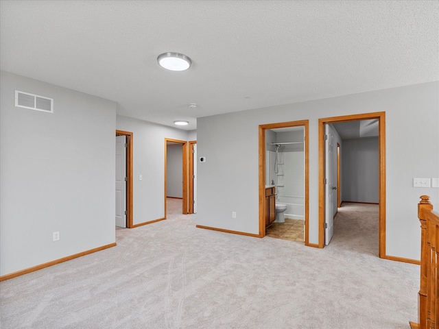 1788 Fescue Ct, Shakopee, MN 55379 - unfurnished bedroom with light carpet and ensuite bathroom