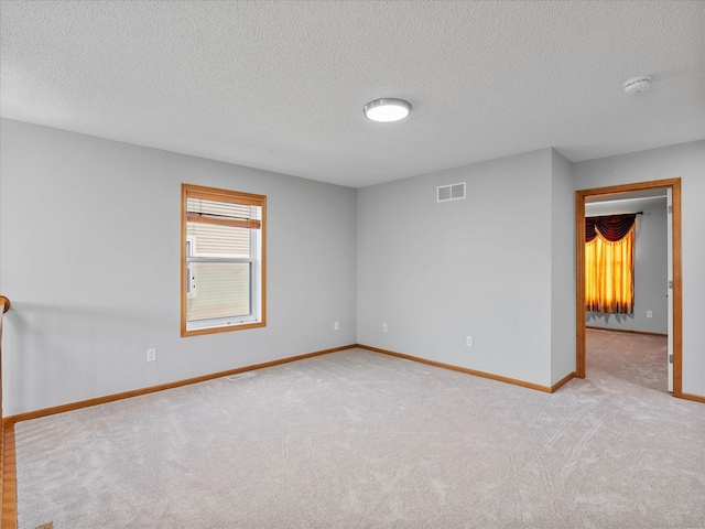 1788 Fescue Ct, Shakopee, MN 55379 - carpeted spare room featuring a smoke detector and a textured ceiling