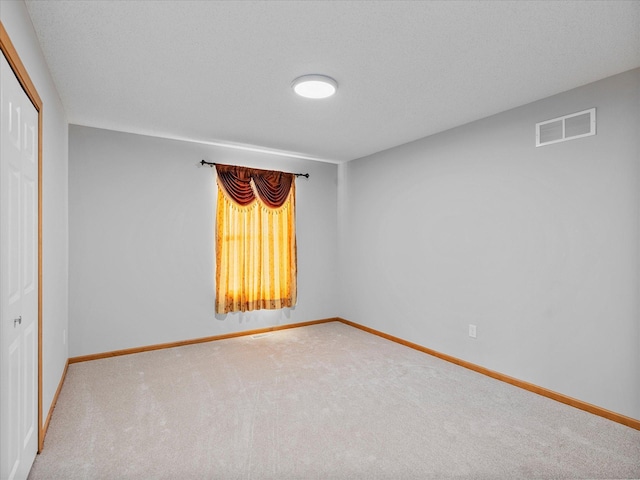 1788 Fescue Ct, Shakopee, MN 55379 - unfurnished bedroom featuring a closet and carpet flooring