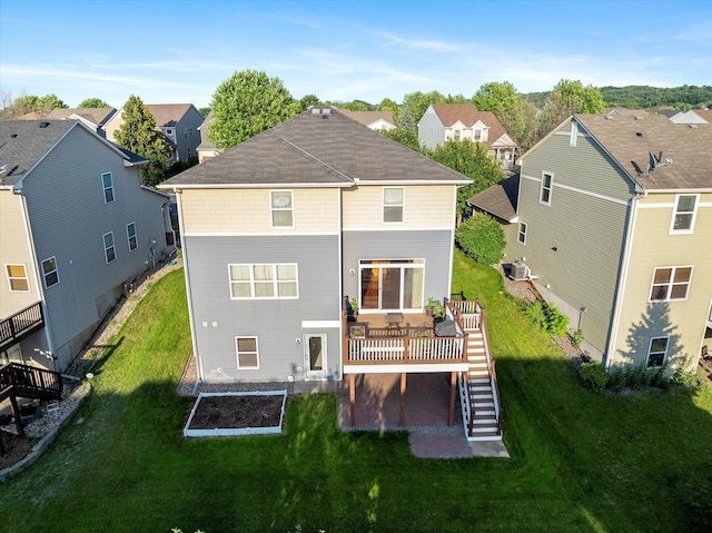 1788 Fescue Ct, Shakopee, MN 55379 - rear view of property with stairway, a residential view, a deck, and a yard