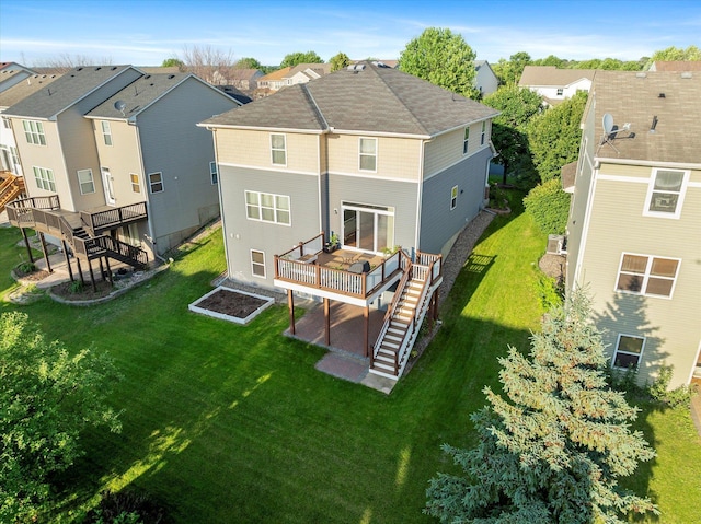 1788 Fescue Ct, Shakopee, MN 55379 - back of house with stairway, a deck, a residential view, and a yard