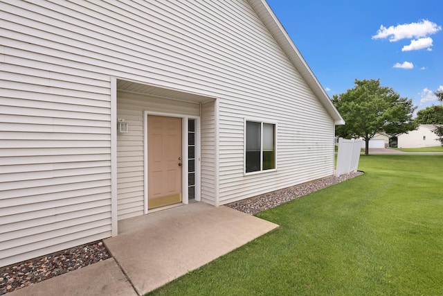 314 Archibald Ln, Dundas, MN 55019 - view of exterior entry with a yard