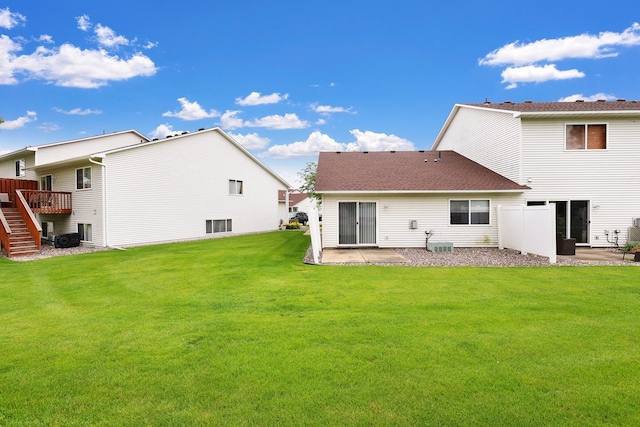 314 Archibald Ln, Dundas, MN 55019 - back of house featuring a patio, stairs, a lawn, and a deck