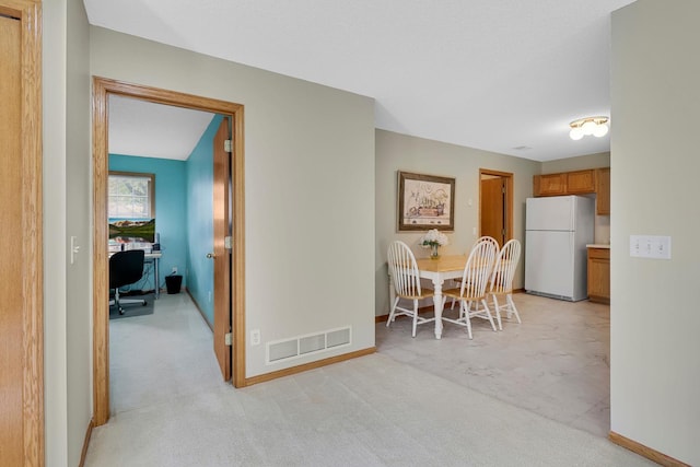 314 Archibald Ln, Dundas, MN 55019 - dining space with light colored carpet and an office area