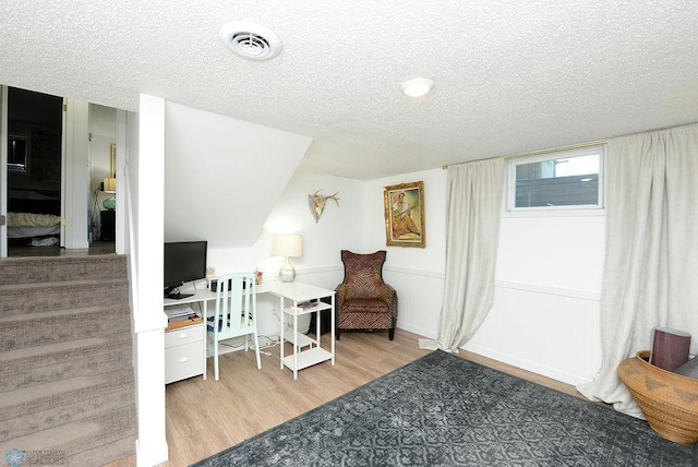2833 1st St N, Fargo, ND 58102 - sitting room featuring a textured ceiling and wood finished floors