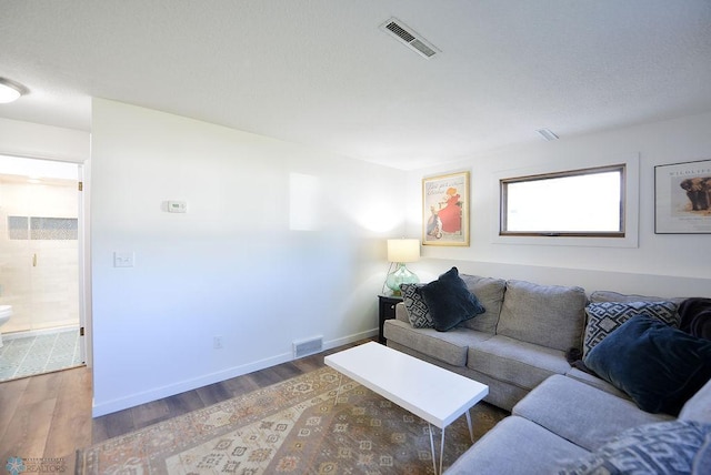 2833 1st St N, Fargo, ND 58102 - living area with wood finished floors and baseboards
