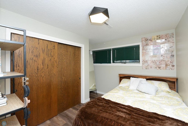 2833 1st St N, Fargo, ND 58102 - bedroom featuring wood finished floors and a closet