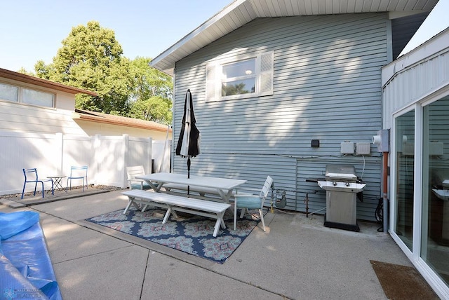 2833 1st St N, Fargo, ND 58102 - view of patio / terrace featuring a grill and outdoor dining space
