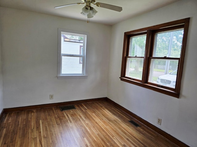915 14th Ave SE, Austin, MN 55912 - spare room with a ceiling fan and hardwood / wood-style flooring