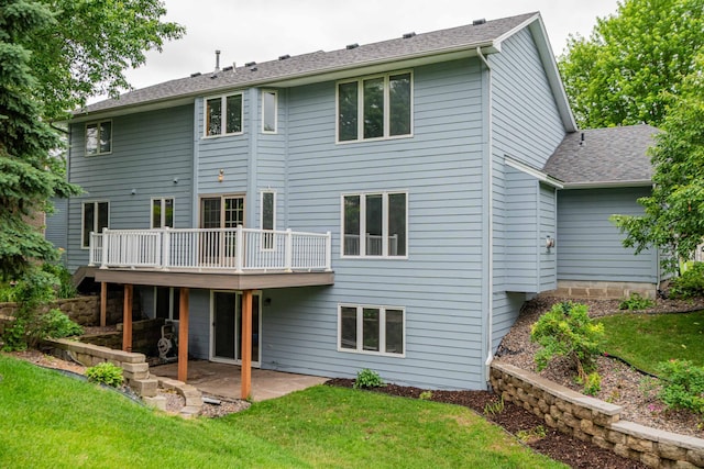 6262 Fernbrook Ln N, Maple Grove, MN 55311 - back of house with a lawn, a patio area, and a deck
