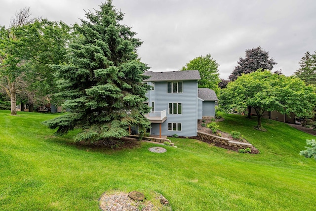 6262 Fernbrook Ln N, Maple Grove, MN 55311 - view of grassy yard with a wooden deck